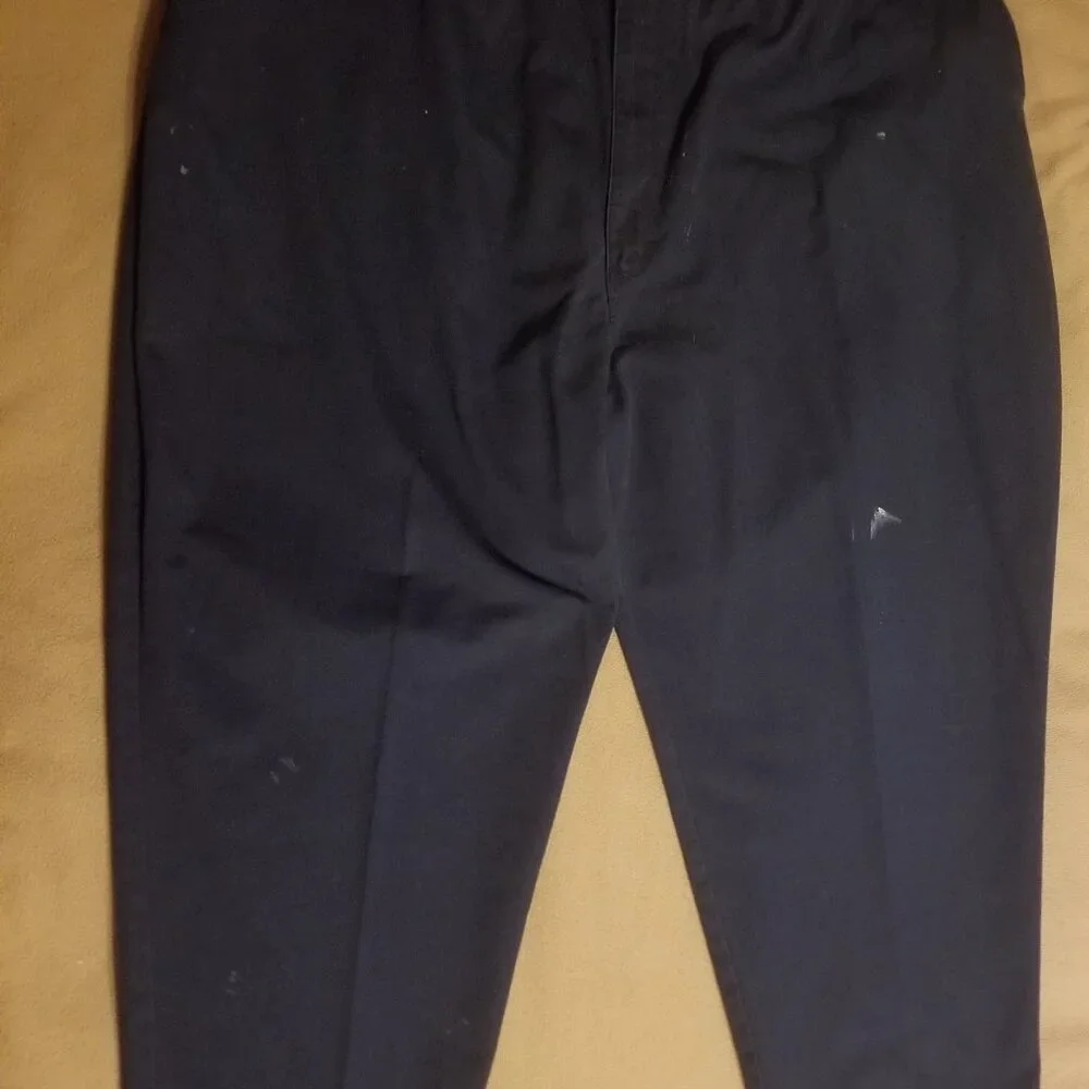 Three stained Cintas men's pants with stretching waistbands